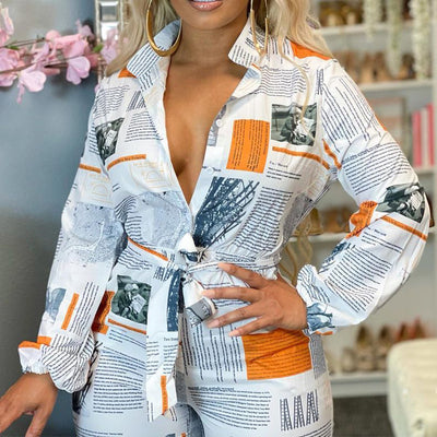 Newspaper Pattern V-Neck Long Sleeve Belted Jumpsuit